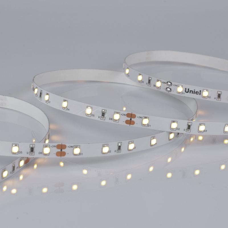 Лента светодиодная теплый белый свет 3000K ULS-2835-60LED/m-8mm-IP20-DC24V-6W/m-5M-WW